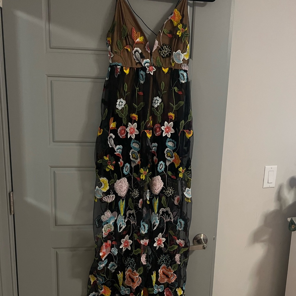 Sheer Black Gown with Exquisite Floral Detailing